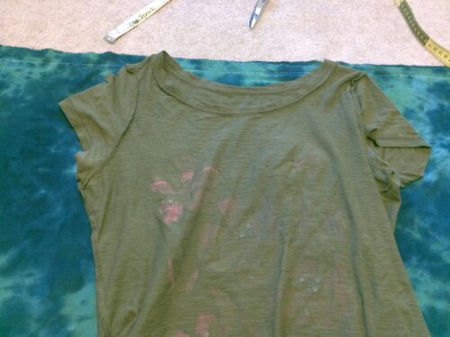 We used a t-shirt to cut a hole for the neck.